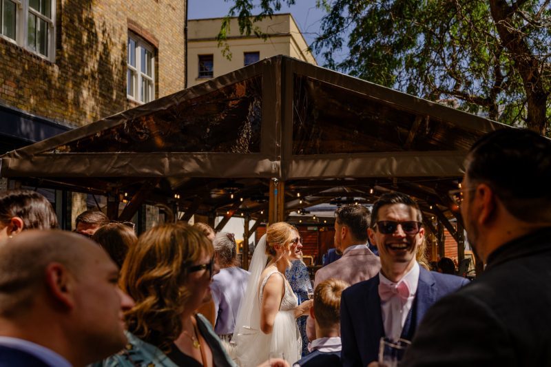 Candid wedding moment in Oxfordshire by Potters Instinct Photography